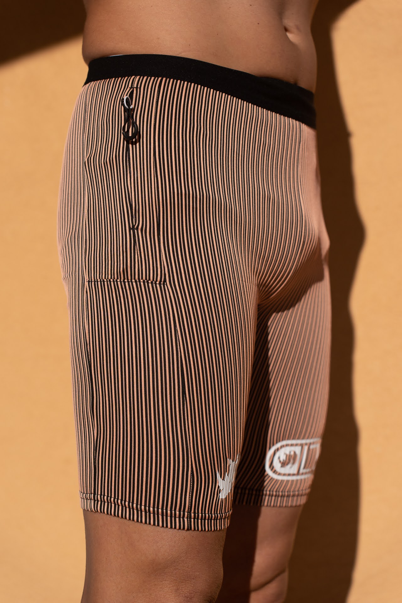 Image d'illustration principale du produit Cuissard Running (Noir/Orange) par LTD Coaching